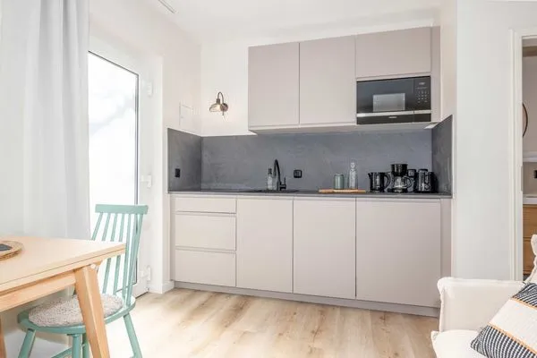 Küche / Küchenzeile Green Village Ferienwohnung Igelnest