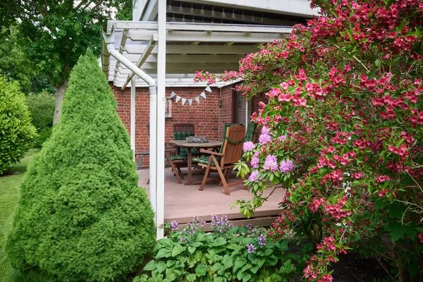 Terrasse  Ferienwohnung „Waterkant“ am Wittensee – viel Platz, Garten und Spielscheune