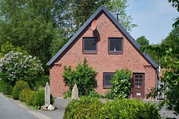 Hauptansicht  Ferienwohnung „Waterkant“ am Wittensee – viel Platz, Garten und Spielscheune