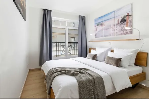 Schlafzimmer  Ferienwohnung Küstenkind direkt am Strand, modern eingerichtet mit Meerblick