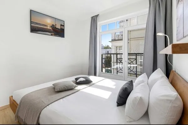 Schlafzimmer  Ferienwohnung Küstenkind direkt am Strand, modern eingerichtet mit Meerblick