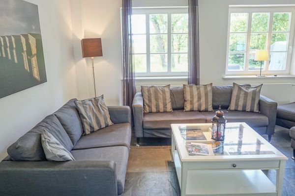  Reetdachhaus Dünenwarft Tönning - Sofagruppe