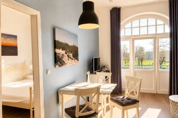 Wohnzimmer  Haus am Park Ferienwohnung 24