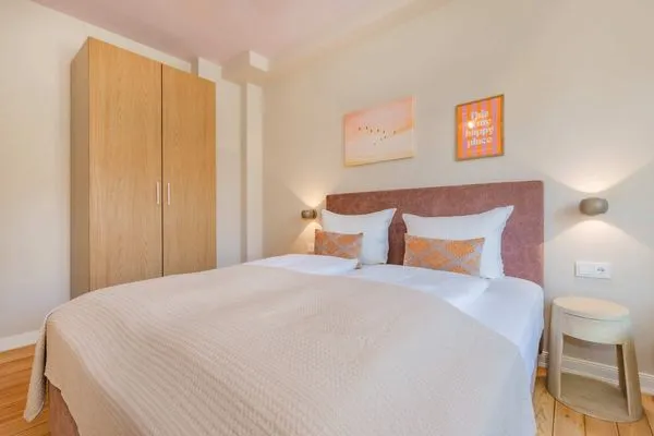 Schlafzimmer  Ferienwohnung Sonnenland mit 2 Bädern, modern eingerichtet & nur 300 Meter zum Strand