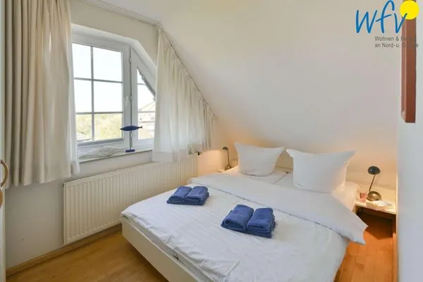 Schlafzimmer Luv und Lee Ferienwohnung Dornbusch