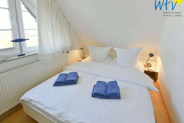 Schlafzimmer Luv und Lee Ferienwohnung Dornbusch