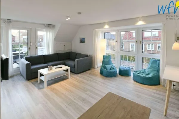 Wohnzimmer Haus Tide Ferienwohnung Calimero