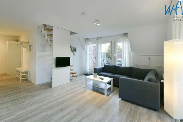 Wohnzimmer Haus Tide Ferienwohnung Calimero