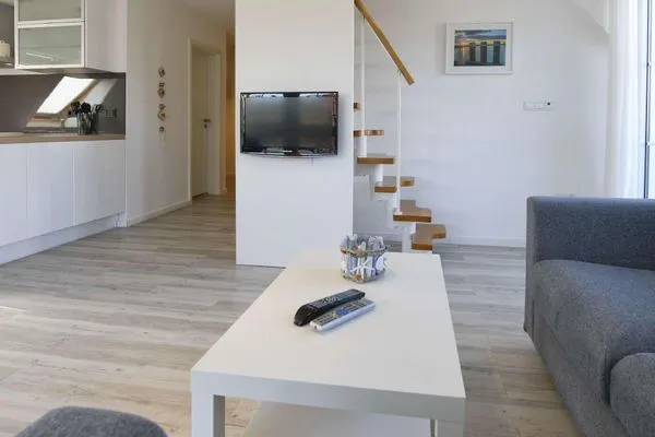 Wohnzimmer Haus Tide Ferienwohnung Calimero