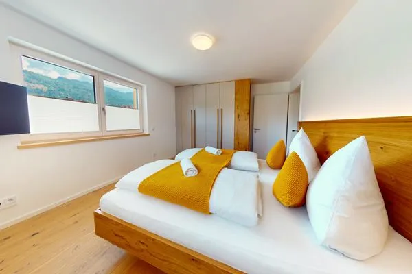 Schlafzimmer  Chalet AlpspitzBlick