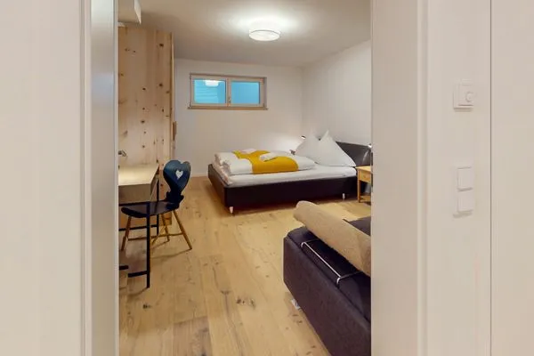Schlafzimmer  Chalet AlpspitzBlick
