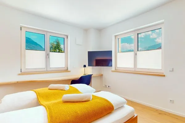 Schlafzimmer  Chalet AlpspitzBlick