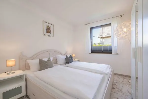 Schlafzimmer  Ferienhaus Sonnendeck mit Sauna, Kamin & Terrasse für 12 Personen
