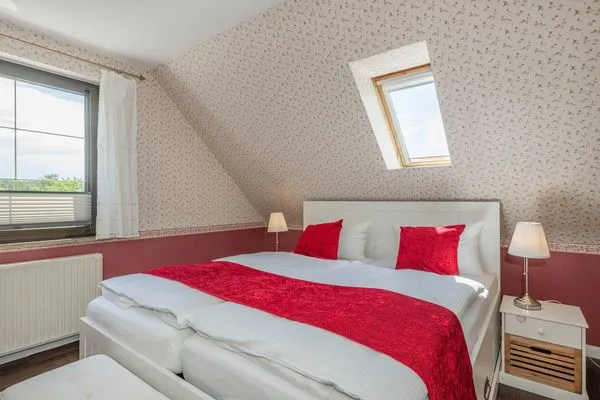 Schlafzimmer  Ferienhaus Sonnendeck mit Sauna, Kamin & Terrasse für 12 Personen