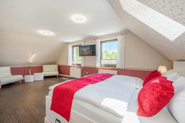 Schlafzimmer  Ferienhaus Sonnendeck mit Sauna, Kamin & Terrasse für 12 Personen