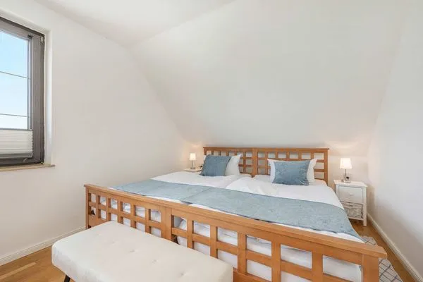 Schlafzimmer  Ferienhaus Sonnendeck mit Sauna, Kamin & Terrasse für 12 Personen
