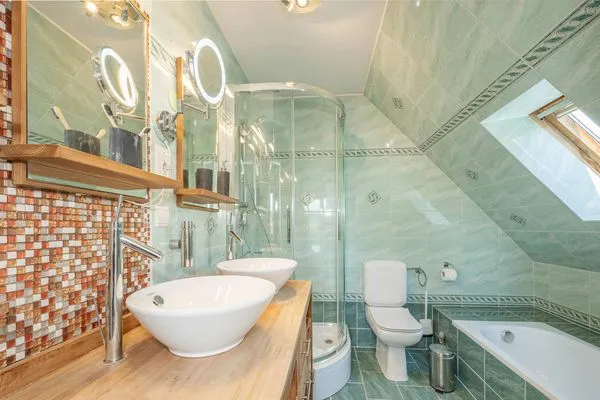 Badezimmer  Ferienhaus Sonnendeck mit Sauna, Kamin & Terrasse für 12 Personen