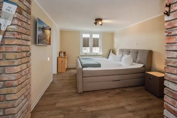 Schlafzimmer  Ferienwohnung Mittschiffs mit Sauna, Whirpool & Garten - nur 500 Meter zum Meer