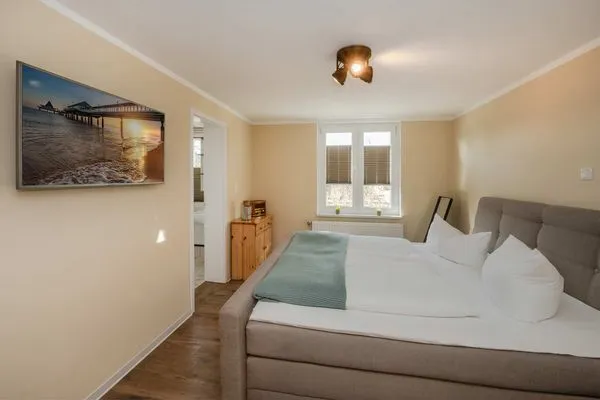 Schlafzimmer  Ferienwohnung Mittschiffs mit Sauna, Whirpool & Garten - nur 500 Meter zum Meer