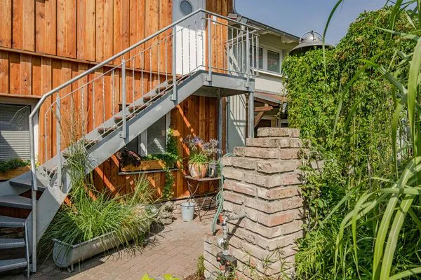 Fassade / Eingang  Ferienwohnung Mittschiffs mit Sauna, Whirpool & Garten - nur 500 Meter zum Meer