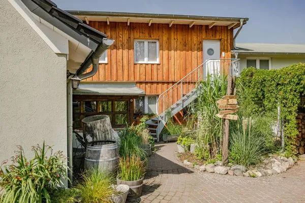 Fassade / Eingang  Ferienwohnung Mittschiffs mit Sauna, Whirpool & Garten - nur 500 Meter zum Meer