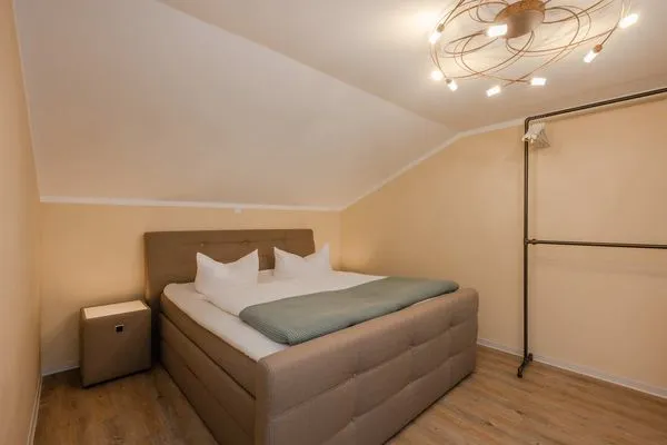 Schlafzimmer  Apartment Brücke mit Garten, Sauna & Hot-Tube - nur 500 Meter zum Strand