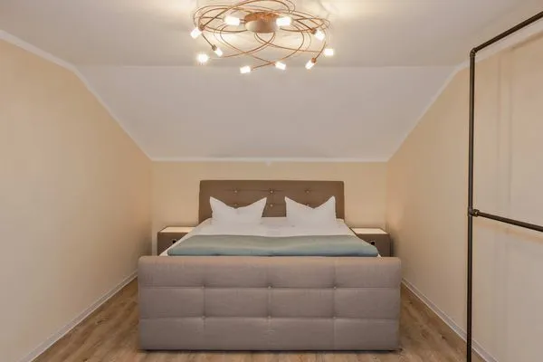 Schlafzimmer  Apartment Brücke mit Garten, Sauna & Hot-Tube - nur 500 Meter zum Strand
