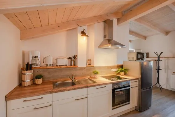 Küche / Küchenzeile  Apartment Brücke mit Garten, Sauna & Hot-Tube - nur 500 Meter zum Strand