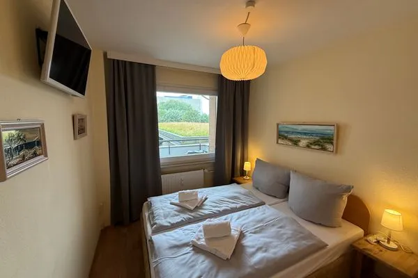 Schlafzimmer Ferienwohnung im Haus Nordland App.121