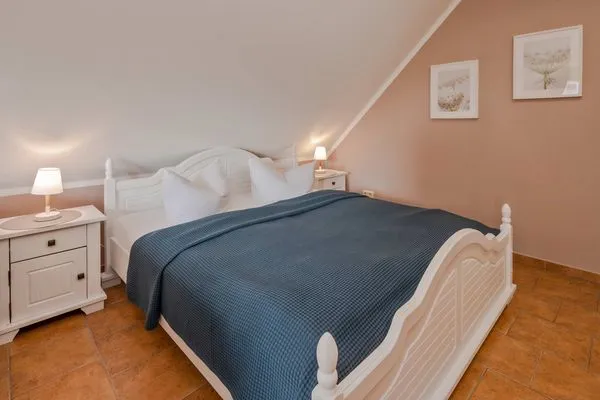 Schlafzimmer  Ferienwohnung Thurbruch mit Sonnenterrasse, ruhig gelegen und perfekt für 4 Personen.