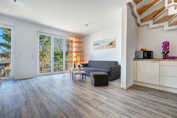 Wohnzimmer  Ferienhaus Ostseeparadies mit 2 Bädern und Terrasse - der Strand ist nur 800 Meter entfernt