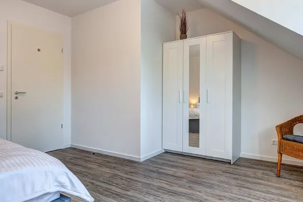 Schlafzimmer  Ferienhaus Ostseeparadies mit 2 Bädern und Terrasse - der Strand ist nur 800 Meter entfernt