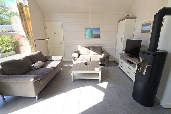 Wohnzimmer  Ferienhaus "Kiek Ut" im Ferienpark Holm an der Ostsee