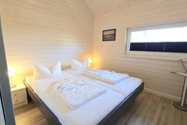 Schlafzimmer  Ferienhaus "Kiek Ut" im Ferienpark Holm an der Ostsee