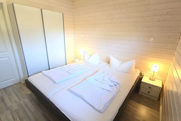Schlafzimmer  Ferienhaus "Kiek Ut" im Ferienpark Holm an der Ostsee