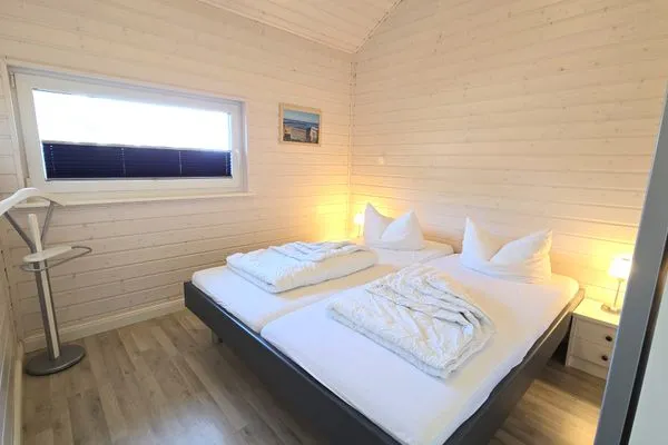 Schlafzimmer  Ferienhaus "Kiek Ut" im Ferienpark Holm an der Ostsee