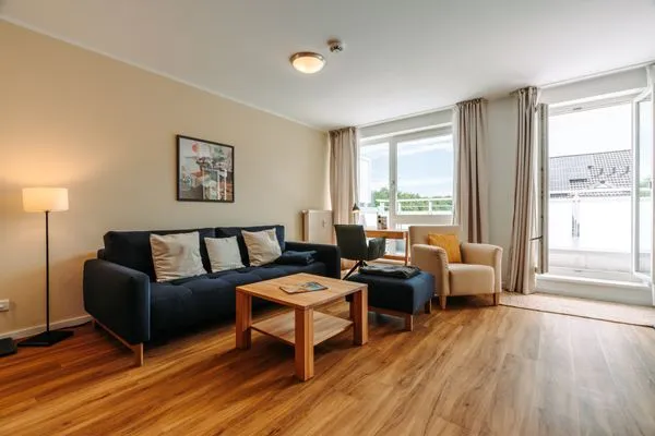 Ferienwohnung Deichkieker Aparthotel Zingst - Wohnzimmer  Deichkieker