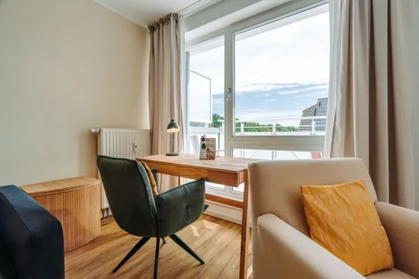 Ferienwohnung Deichkieker Aparthotel Zingst - Wohnzimmer  Deichkieker
