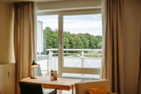 Ferienwohnung Deichkieker Aparthotel Zingst - Wohnzimmermer  Deichkieker