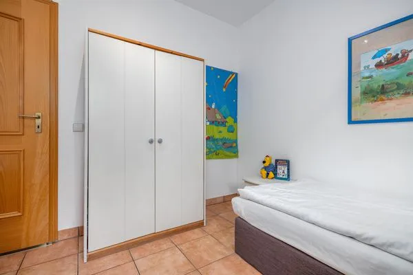 Schlafzimmer mit zwei Einzelbetten Ferienpark Freesenbruch Doppelhaushälfte 9a - Leuchtturm