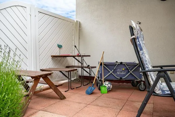 Kinderspielecke auf der Terrasse Ferienpark Freesenbruch Doppelhaushälfte 9a - Leuchtturm