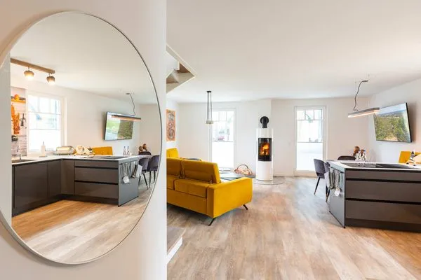 Wohnzimmer  Ferienhaus Baltic Huus mit Sauna, Kamin und Sonnenterrasse