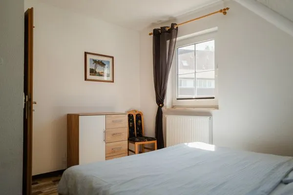 Schlafzimmer mit Doppelbett Am Deich Am Deich Haus 26