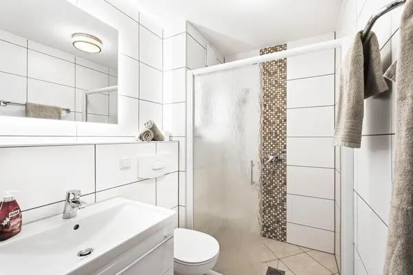 Bad mit Dusche und WC Residenz am Strand Wohnung 4-57
