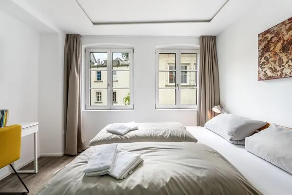 Multi-Fewo-Haus Zitronengässle 1 Ferienwohnung Metta Lindau Insel - Schlafzimmer - Doppelbett