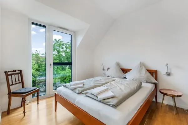 Multi-FeWo Haus Zeppelinstraße Ferienwohnung Urlaubsglück Lindau Insel - Schlafzimmer - Doppelbett