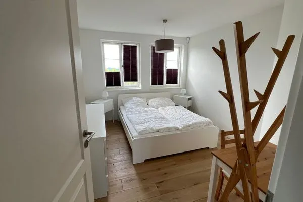 Schlafzimmer  Ferienwohnung Inselblick - bis Hiddensee und nach Mön