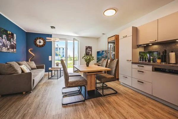 Wohnzimmer  Ferienwohnung Otterhöhle mit Fitness-, Sauna und Kinderspielbereich.