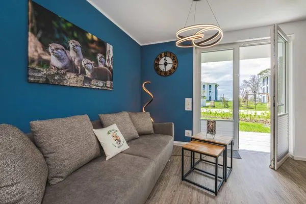 Wohnzimmer  Ferienwohnung Otterhöhle mit Fitness-, Sauna und Kinderspielbereich.