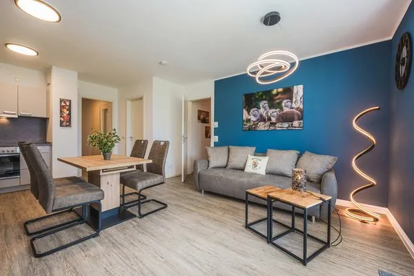 Wohnzimmer  Ferienwohnung Otterhöhle mit Fitness-, Sauna und Kinderspielbereich.